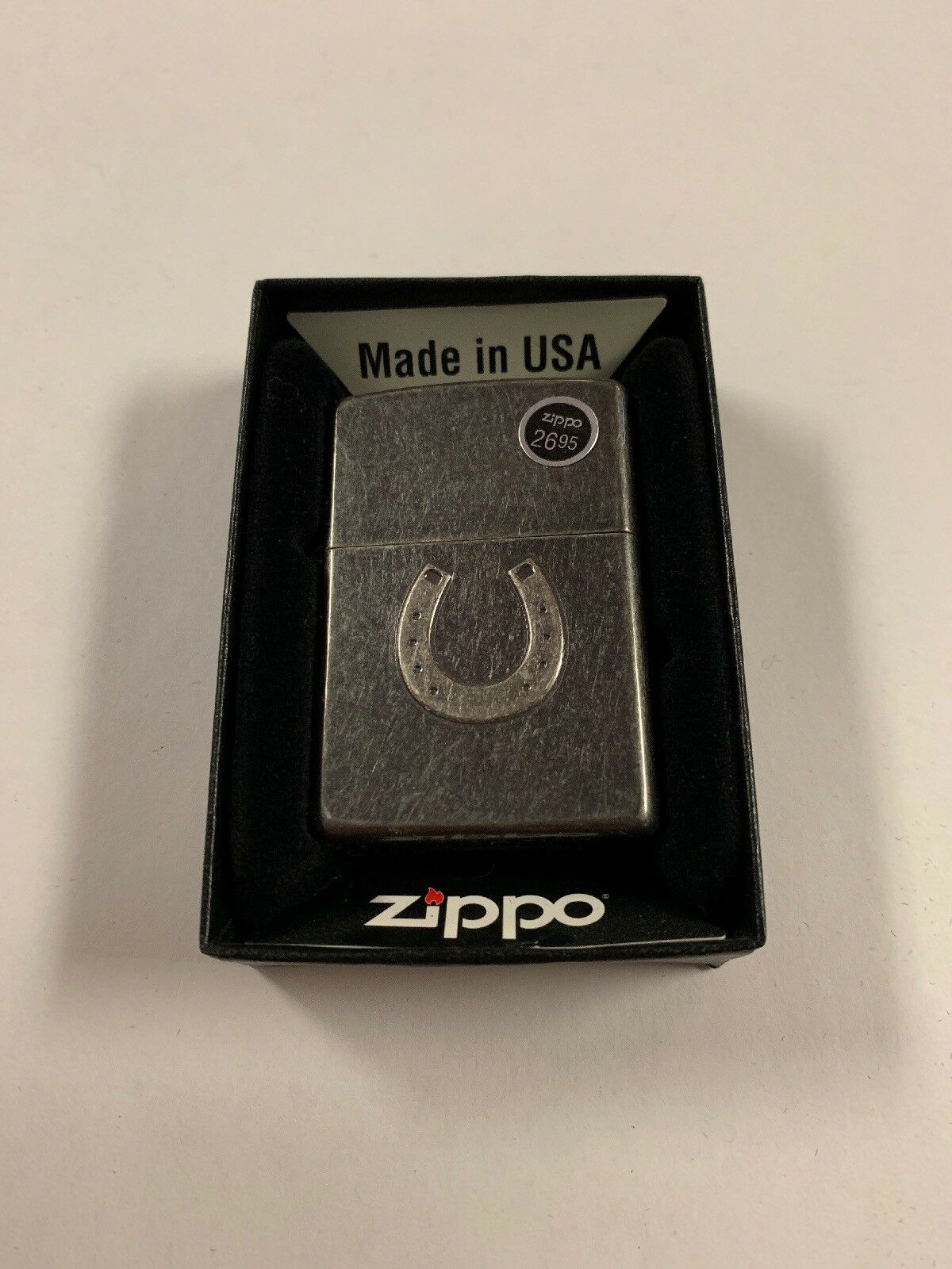 Zippo Translucent Gray Dusk Horseshoe Pocket Lighter - All Mixed Up 